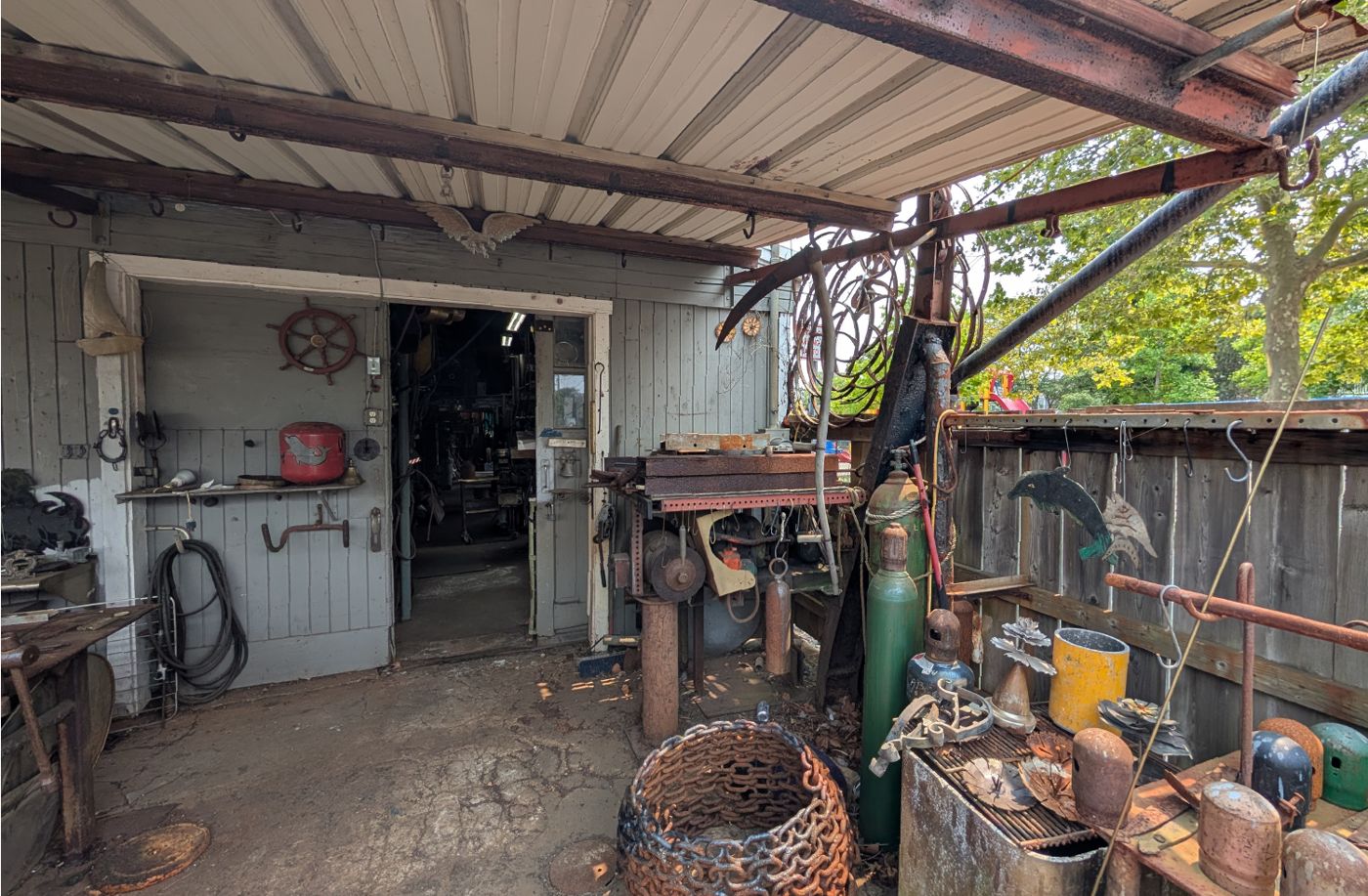 The covered workshop with tools and welding tanks